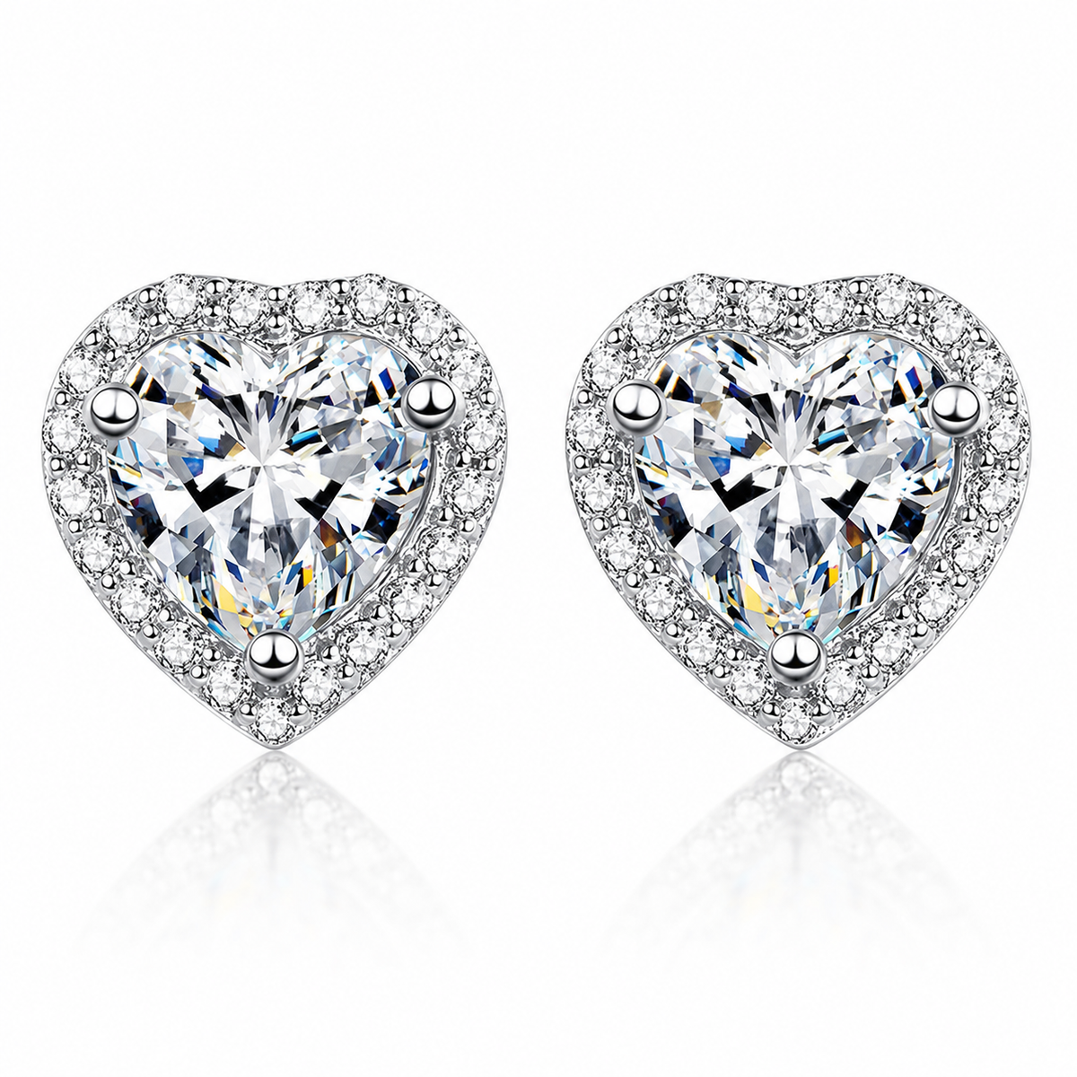 Silver heart-cut colourless moissanite halo stud earrings shown front-on against a white background