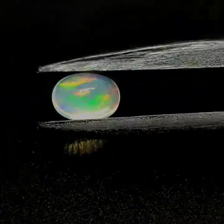 0.86ct Oval Cabochon Ethiopian Welo Opal - Premium Jewelry from Dazzling Delights - Just $74.95! Shop now at Dazzling Delights