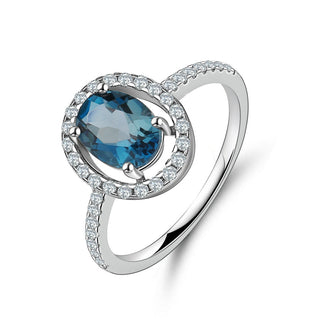 "The Eye of London" 8x6mm Oval Cut Natural London Blue Topaz Halo Ring - Premium Jewelry from Dazzling Delights - Just $66.75! Shop now at Dazzling Delights