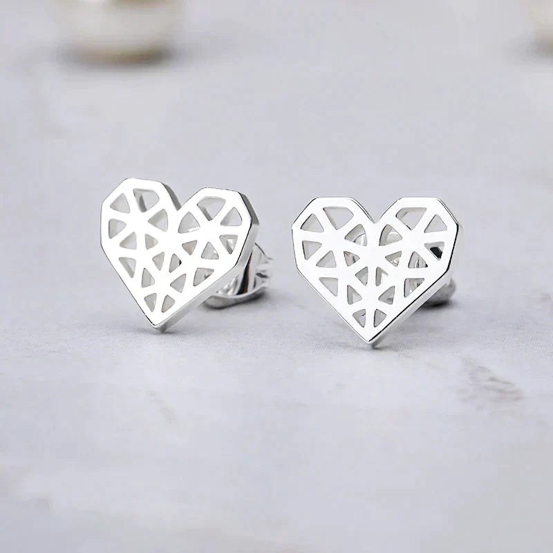 Silver Titanium Heart Stud Earrings - Premium Jewelry from Dazzling Delights - Just $22.95! Shop now at Dazzling Delights