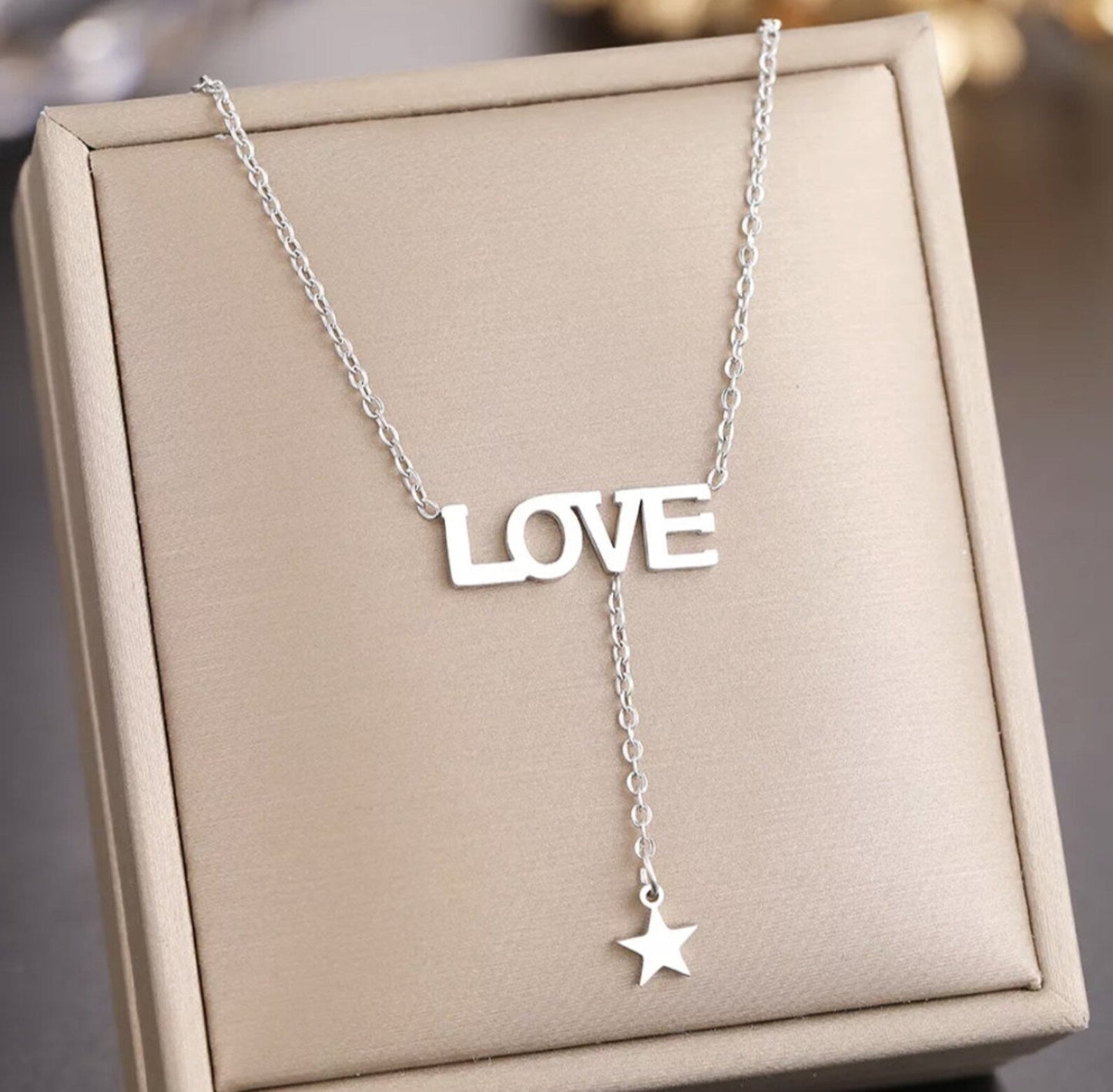 Silver Titanium LOVE Star Necklace - Premium Jewelry from Dazzling Delights - Just $22.95! Shop now at Dazzling Delights