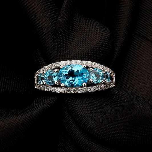 "The Heavenly Quintet" Natural Oval and Round Cut Sky Blue Topaz Ring - Premium Jewelry from Dazzling Delights - Just $106.95! Shop now at Dazzling Delights
