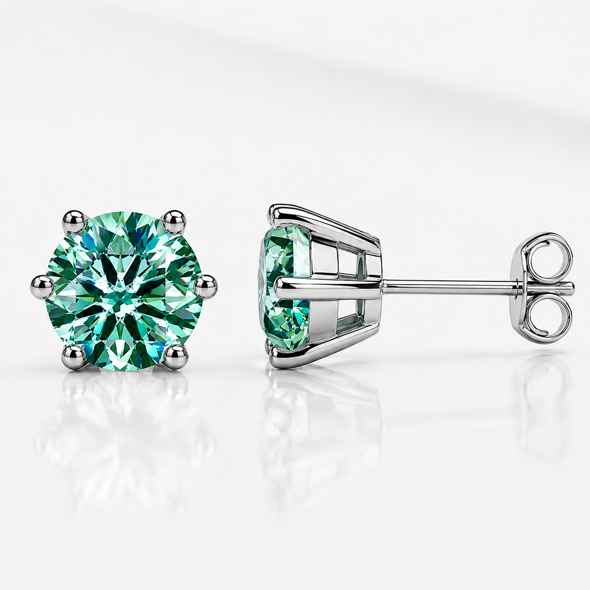 Yellow gold six-prong green moissanite stud earrings shown front and side on a white background