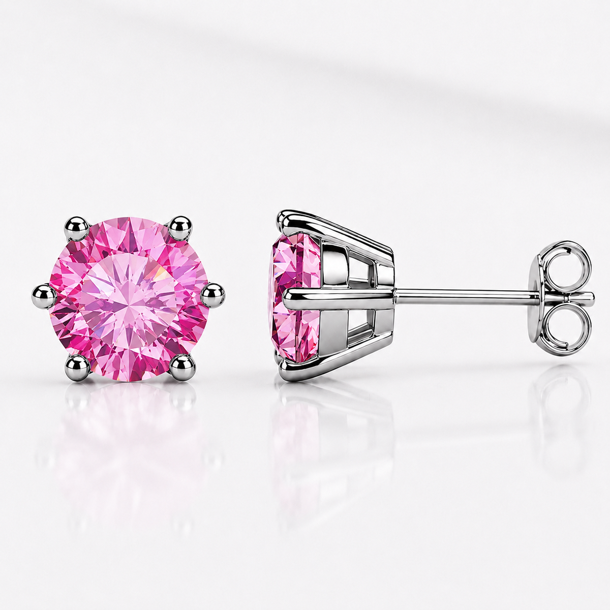 White gold six-prong royal blue moissanite stud earrings shown front and side on a white background