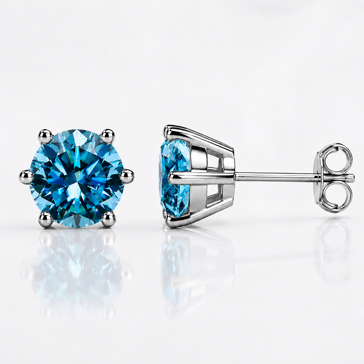 White gold six-prong dark green moissanite stud earrings shown front and side on a white background