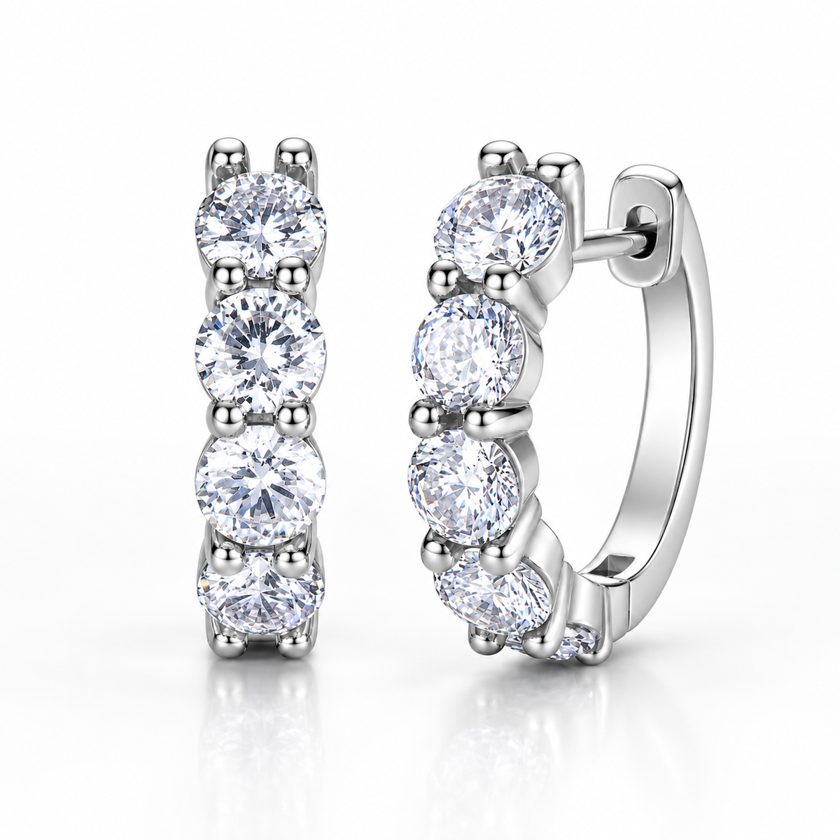 Silver five-stone moissanite hoop earrings on a white background
