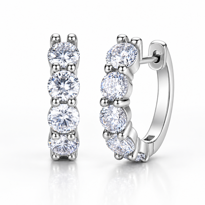 Silver five-stone moissanite hoop earrings on a white background