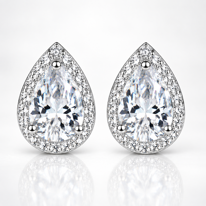 Silver pear-cut halo moissanite stud earrings on a white background
