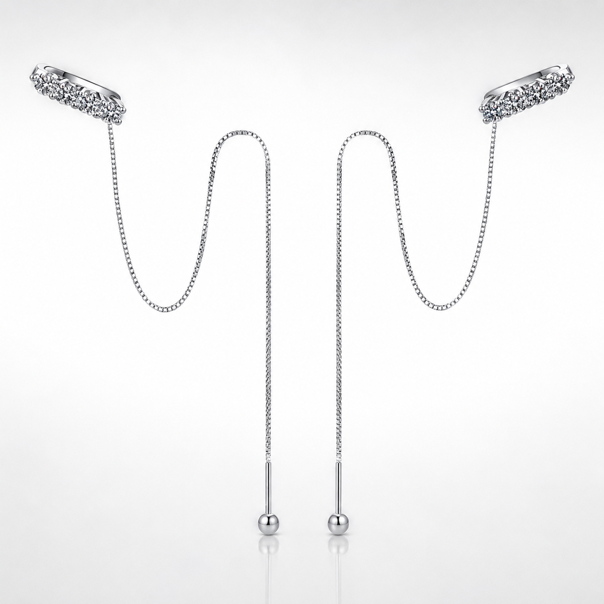 Silver moissanite threader chain earrings shown as a pair on a white background
