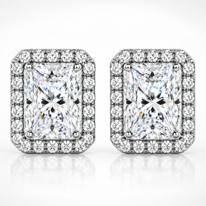Silver radiant cut halo moissanite stud earrings shown front-on against a white background