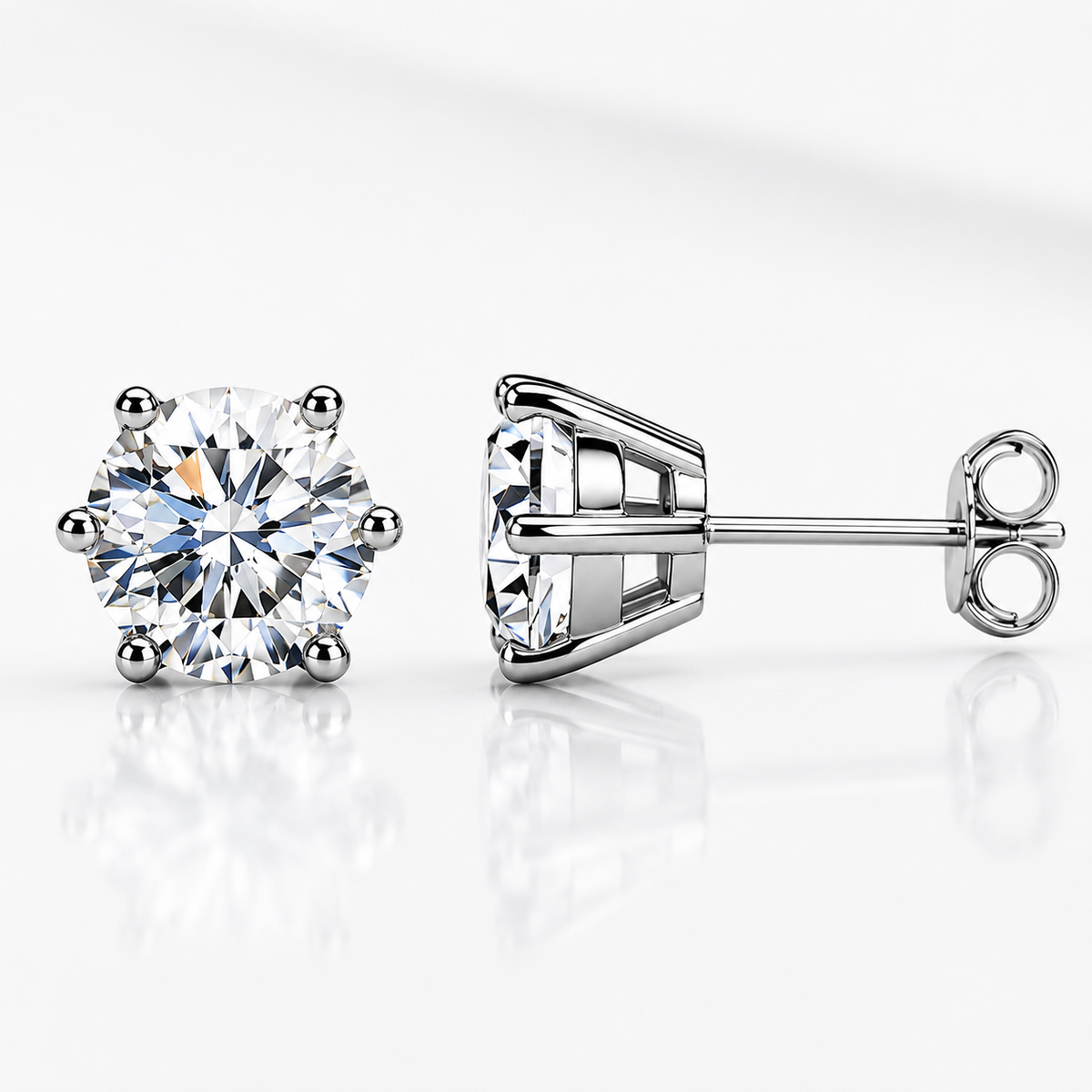 White gold six-prong sea blue moissanite stud earrings shown front and side on a white background