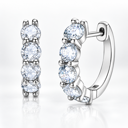 Silver five-stone moissanite hoop earrings on a white background