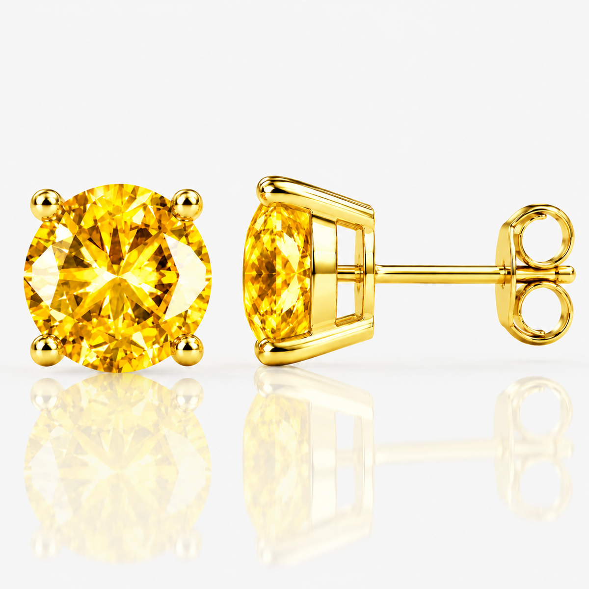 Gold four-prong vivid yellow moissanite stud earrings shown front and side on a white background