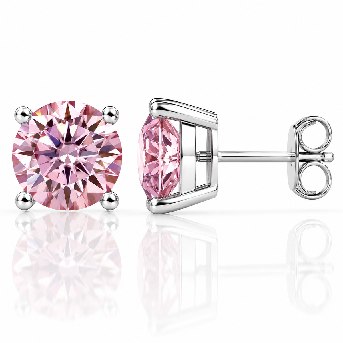 Silver four-prong soft pink moissanite stud earrings shown front and side on a white background