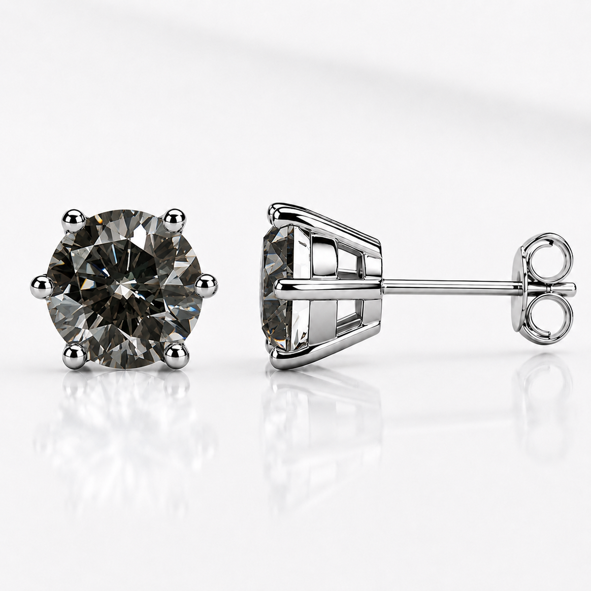 Yellow gold six-prong light blue moissanite stud earrings shown front and side on a white background