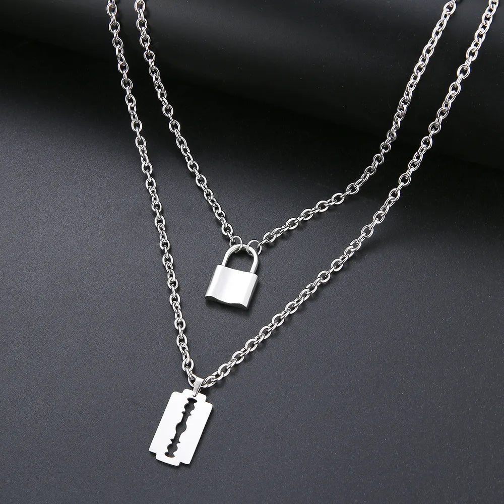 Titanium Double Layer Lock and Blade Pendant Necklace - Premium Jewelry from Dazzling Delights - Just $29.95! Shop now at Dazzling Delights