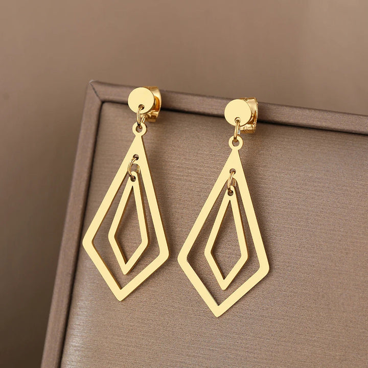 Pendientes colgantes geométricos de titanio