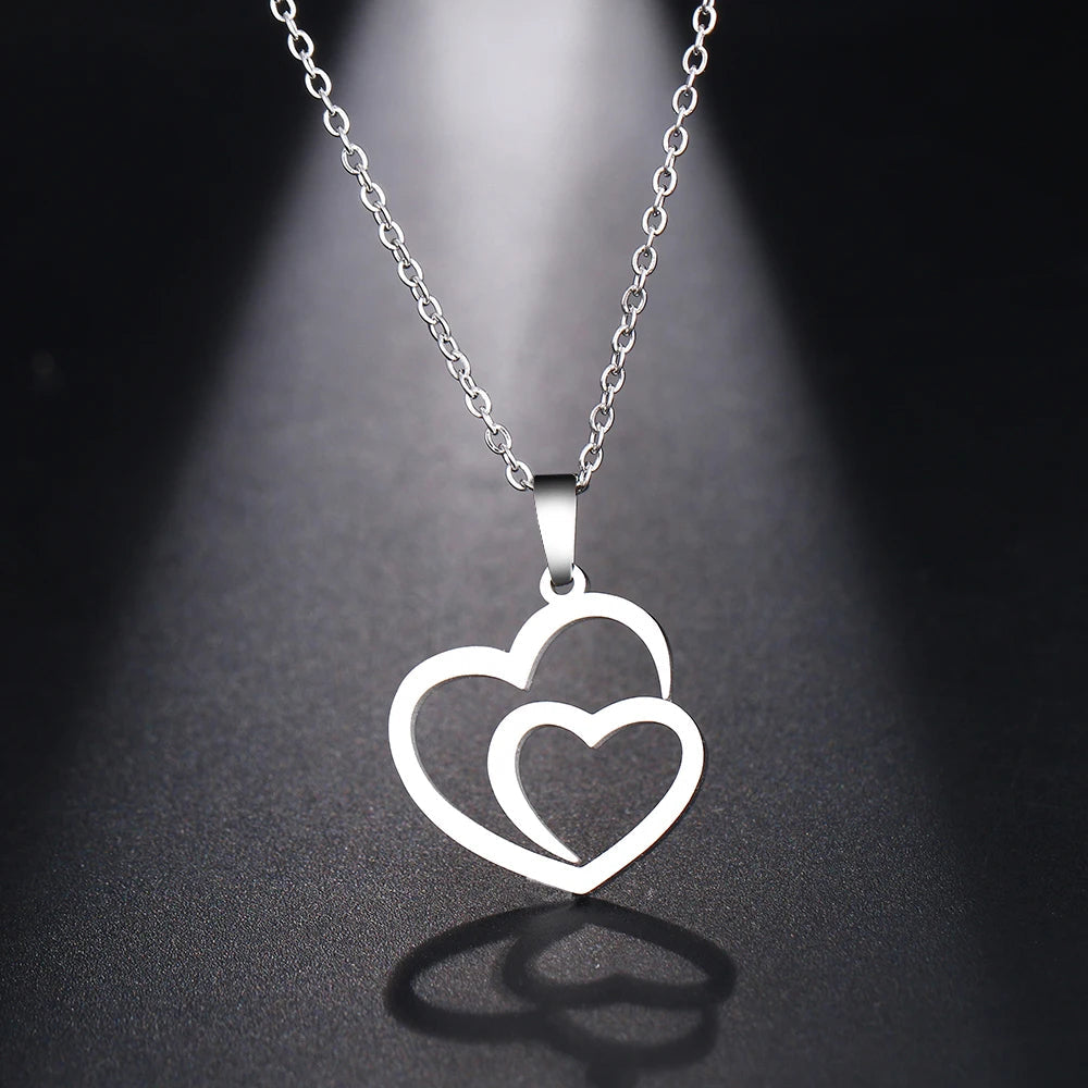 Gold Titanium Double Heart Pendant Necklace - Premium Jewelry from Dazzling Delights - Just $28.95! Shop now at Dazzling Delights