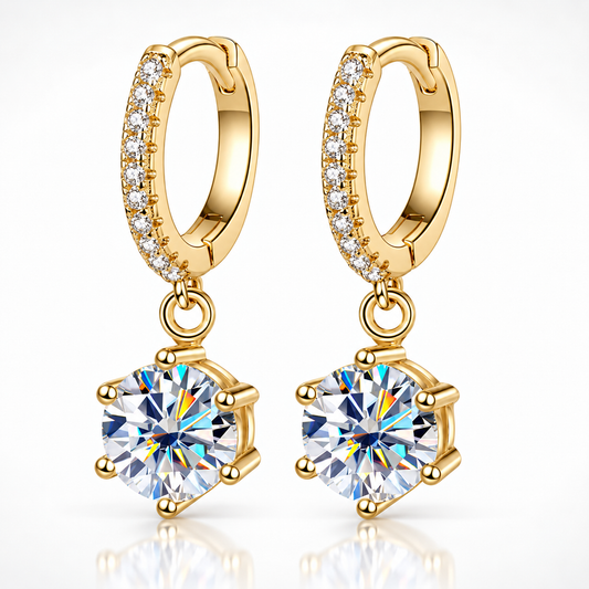 Gold pavé hoop drop earrings with round moissanite solitaires on a white background