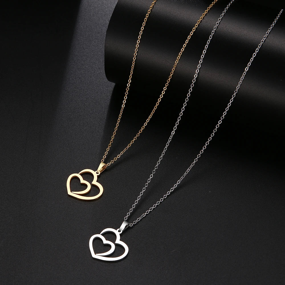 Gold Titanium Double Heart Pendant Necklace - Premium Jewelry from Dazzling Delights - Just $28.95! Shop now at Dazzling Delights