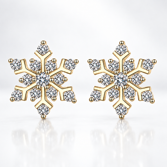 Gold snowflake moissanite stud earrings on a white background