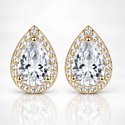 Gold pear-cut halo moissanite stud earrings on a white background