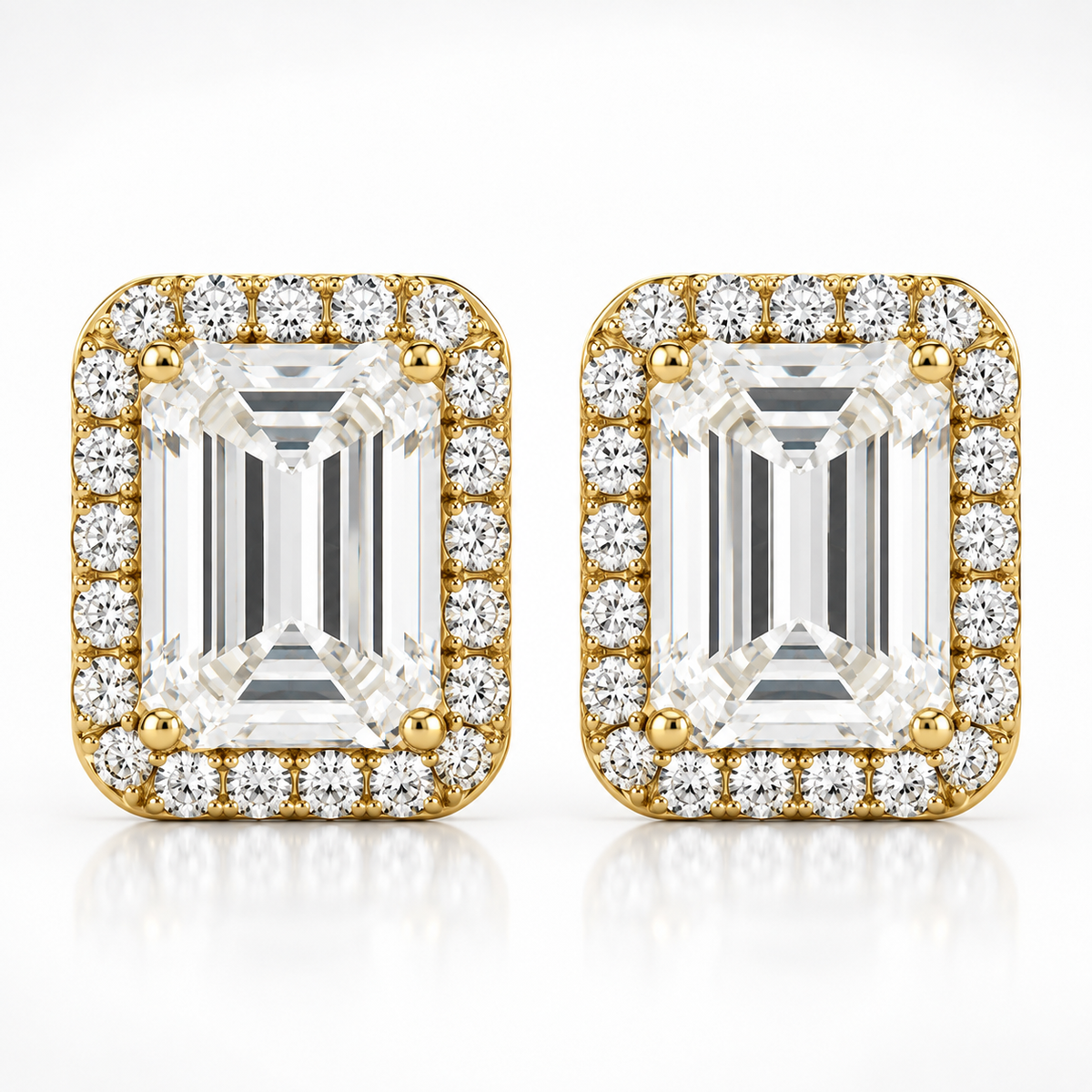 Gold emerald cut halo moissanite stud earrings shown front-on against a white background