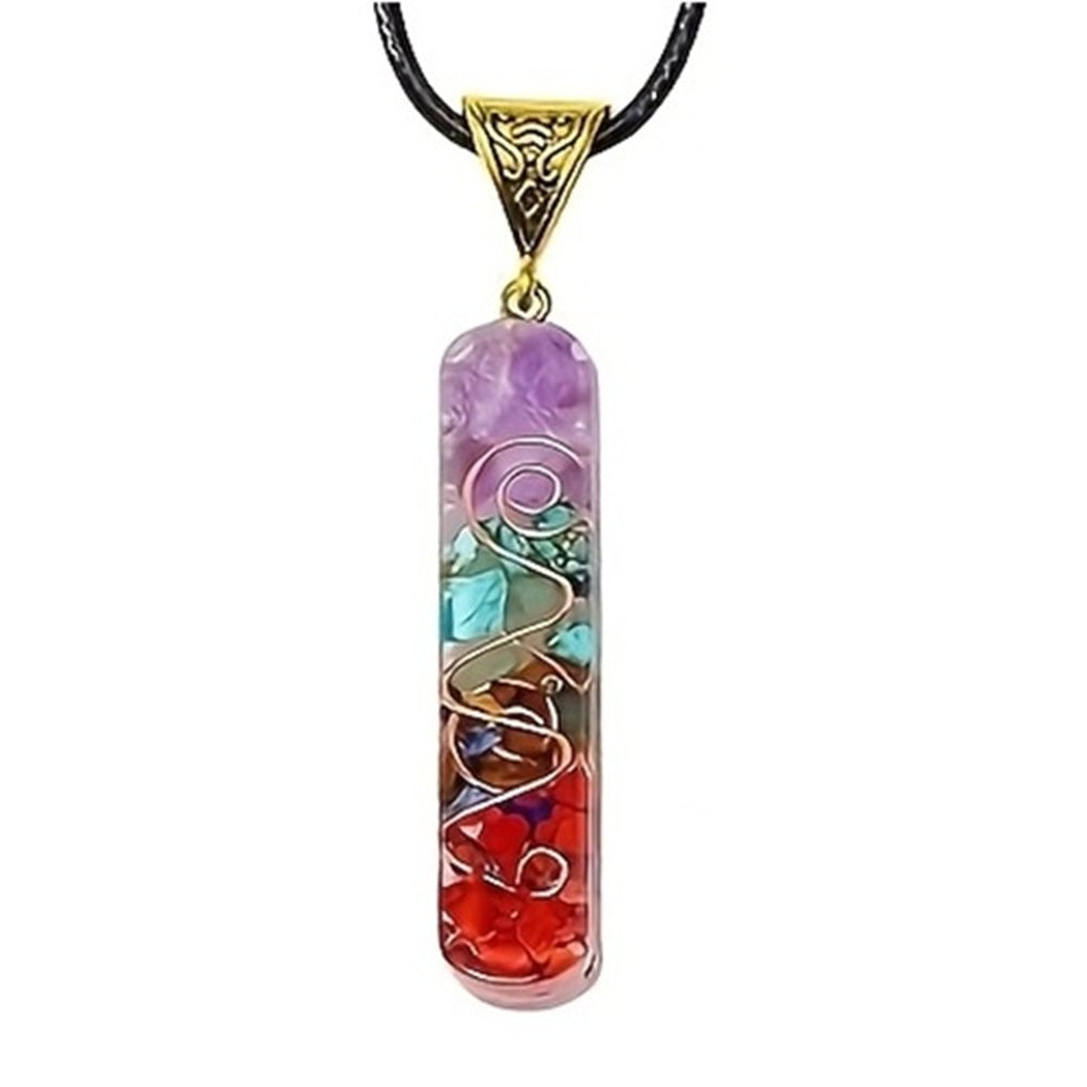 Vertical bar-shaped chakra pendant necklace with copper spiral and stacked layers of chakra-coloured crystal chips set in clear resin.