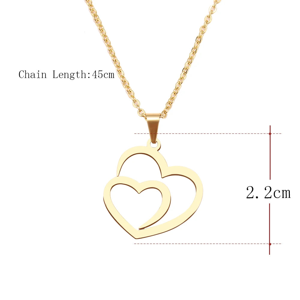 Gold Titanium Double Heart Pendant Necklace - Premium Jewelry from Dazzling Delights - Just $28.95! Shop now at Dazzling Delights