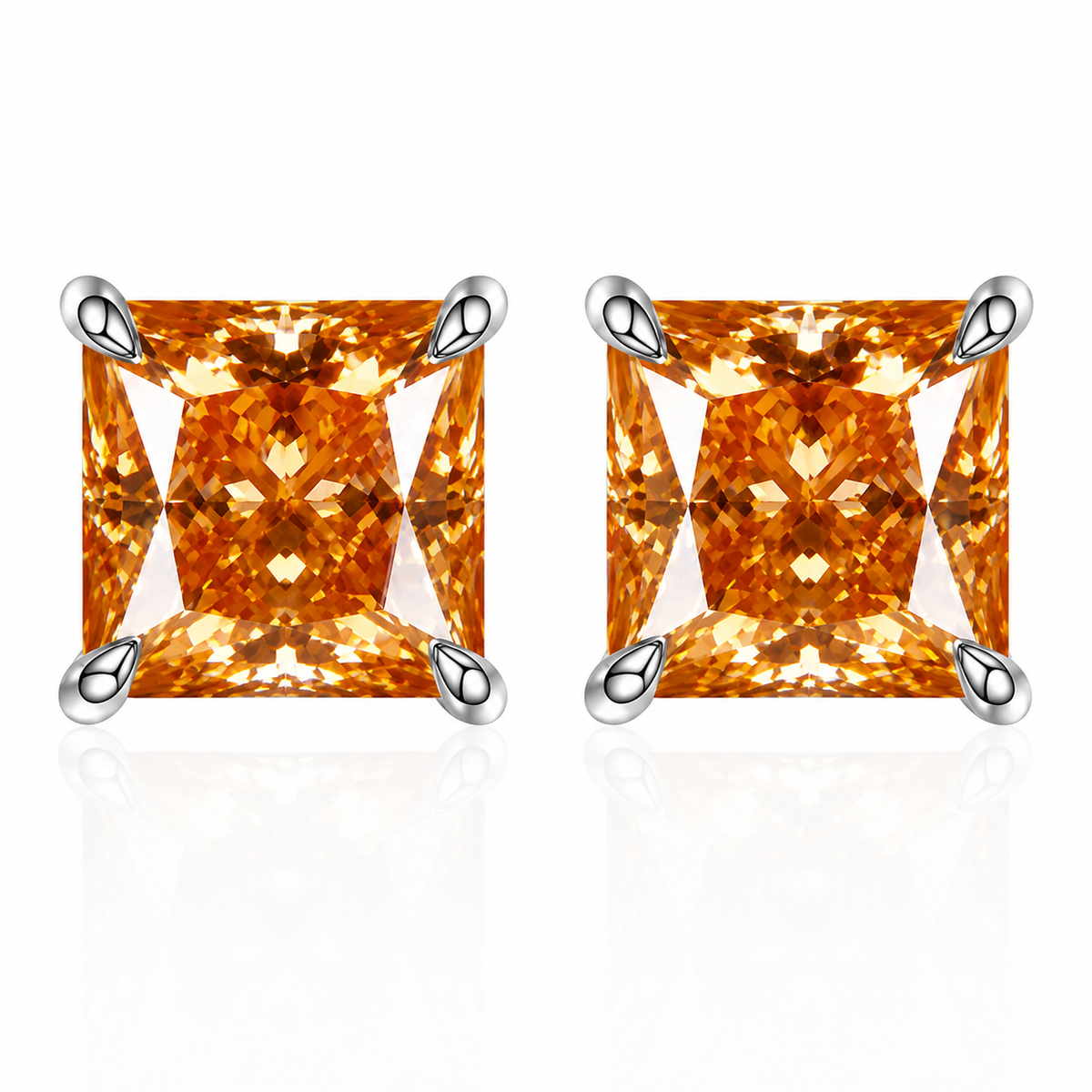 Silver princess-cut golden champagne moissanite stud earrings on a white background