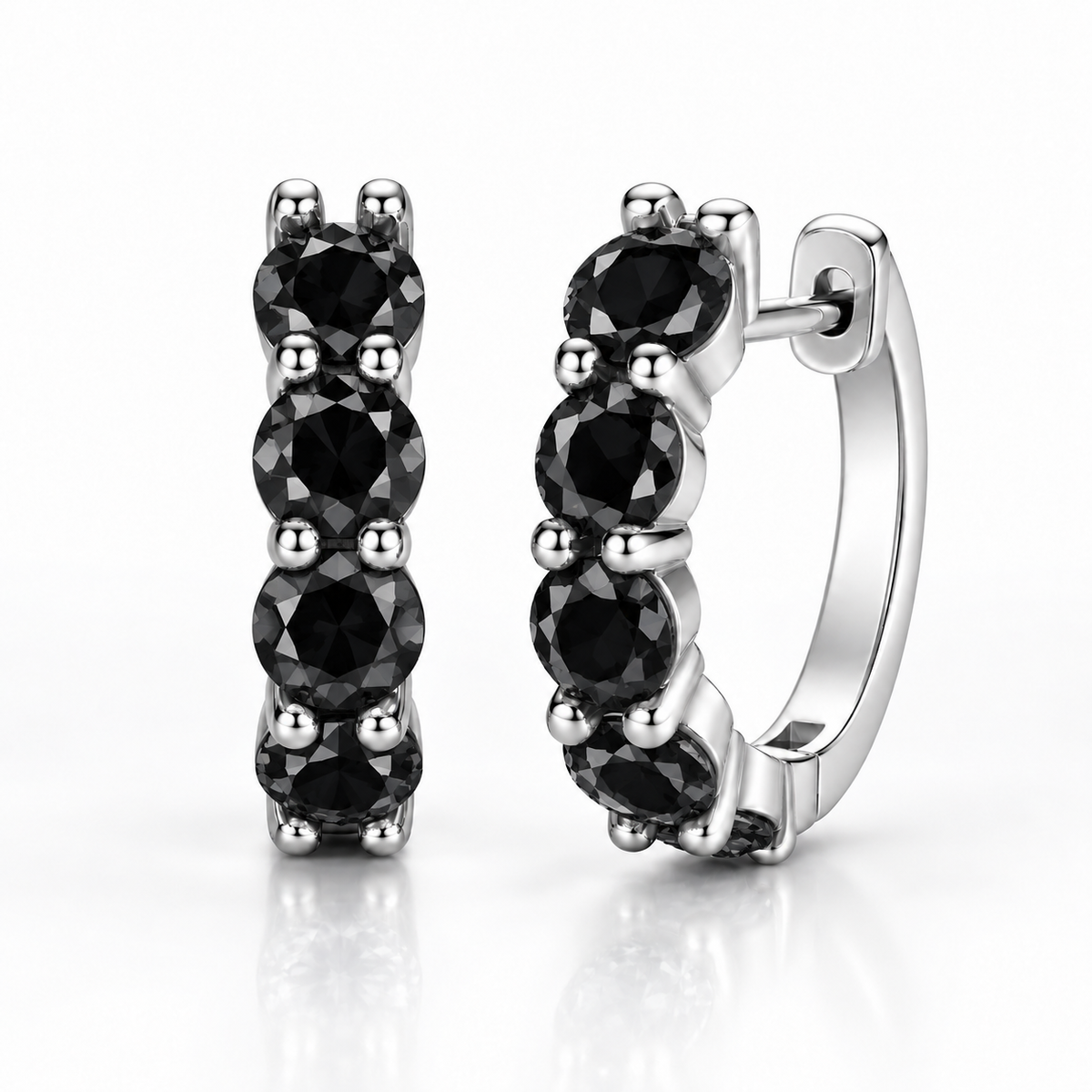 Silver five-stone hoop earrings with black moissanite on a white background