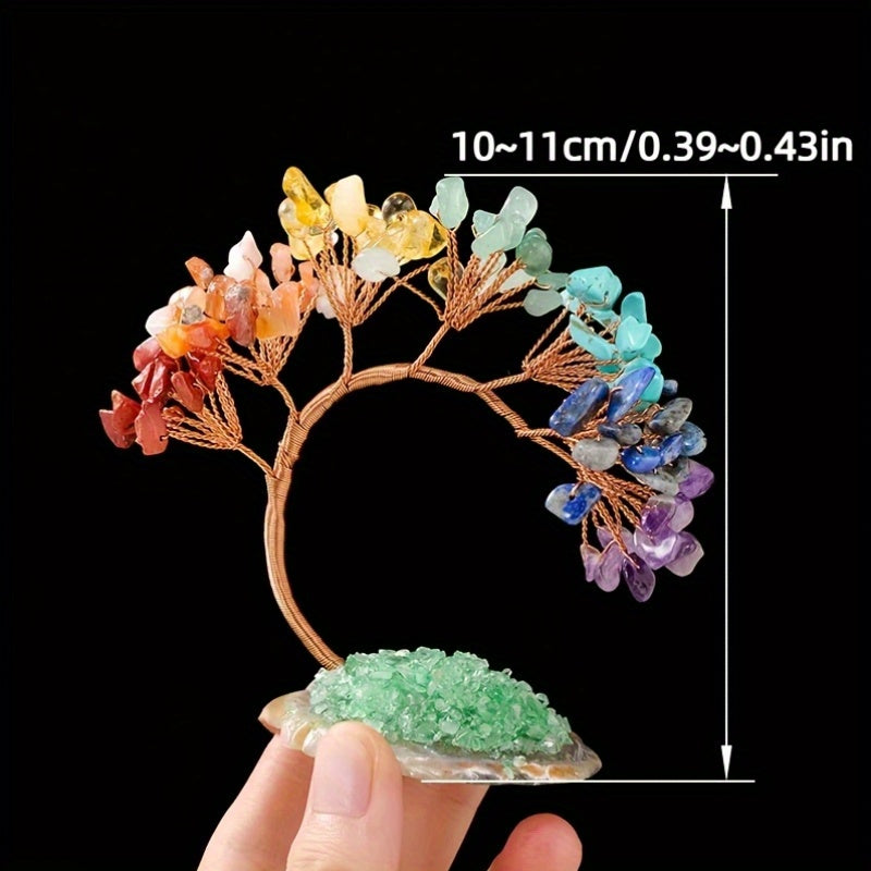 Chakra gemstone bonsai tree on black background, dimensions shown as 10–11cm tall, held in hand for scale.