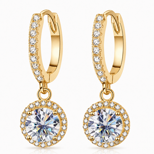 Gold halo moissanite hoop drop earrings with colourless round centres shown on a white background