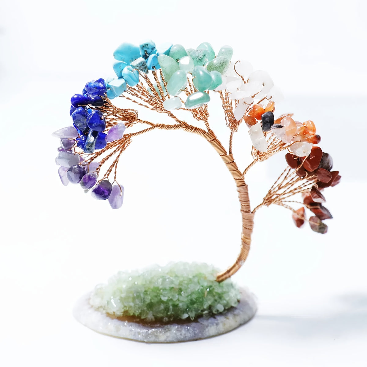 Single chakra gemstone tree with twisted copper wire trunk and multicoloured crystal branches on a circular druzy quartz base.