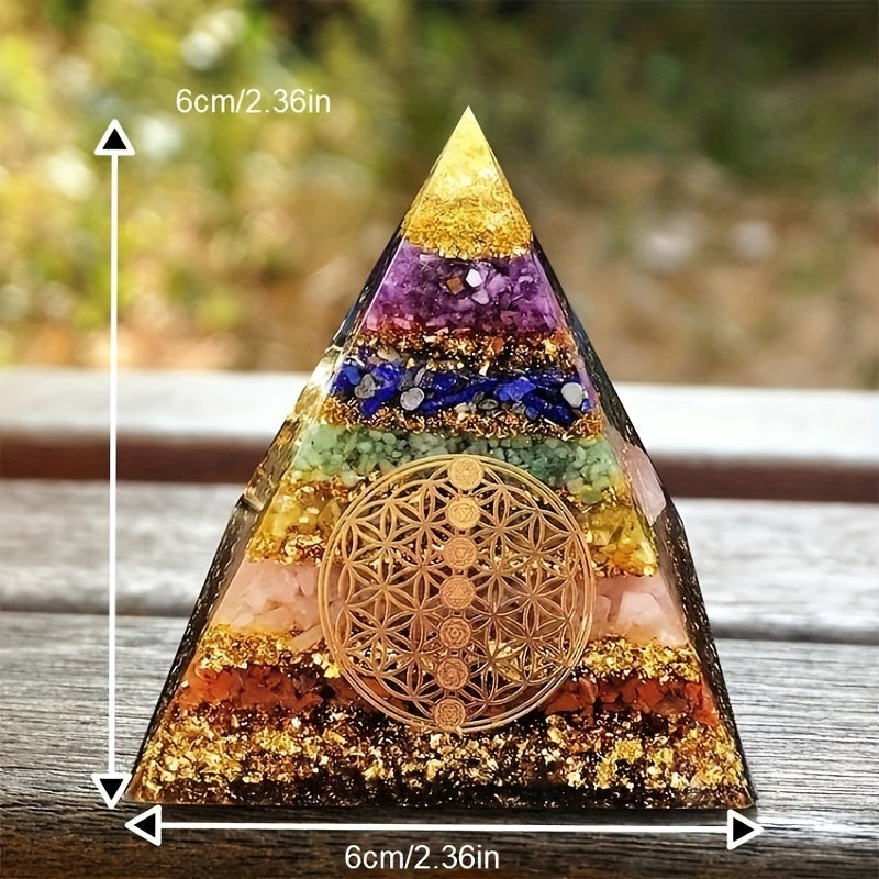Chakra pyramid with Flower of Life symbol displayed on a wooden bench, showing 6cm x 6cm dimensions for product scale.