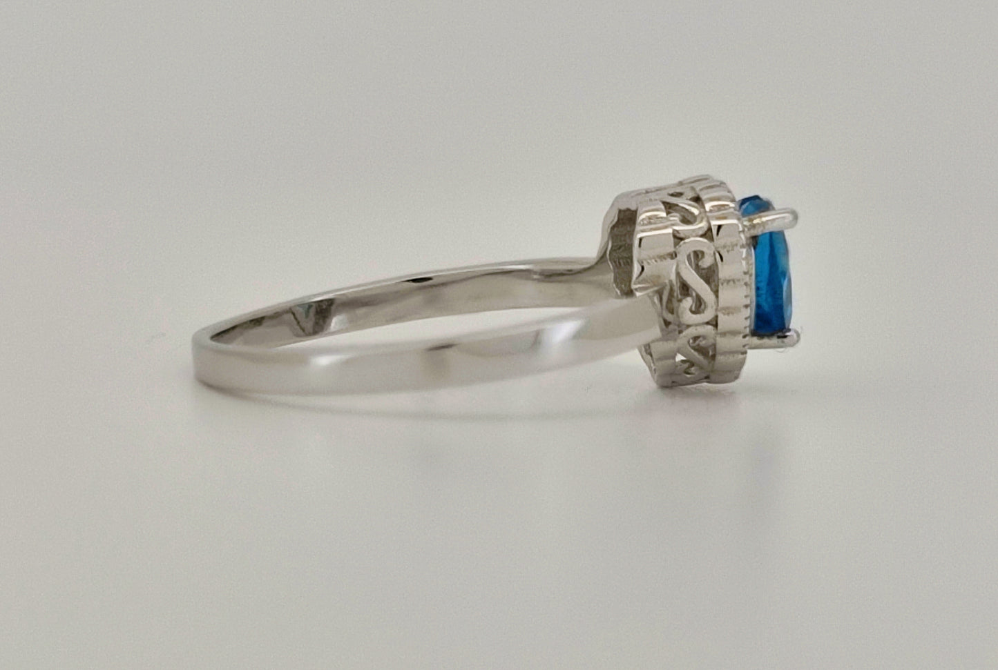Heart Cut Swiss Blue Topaz and White Topaz Halo Ring