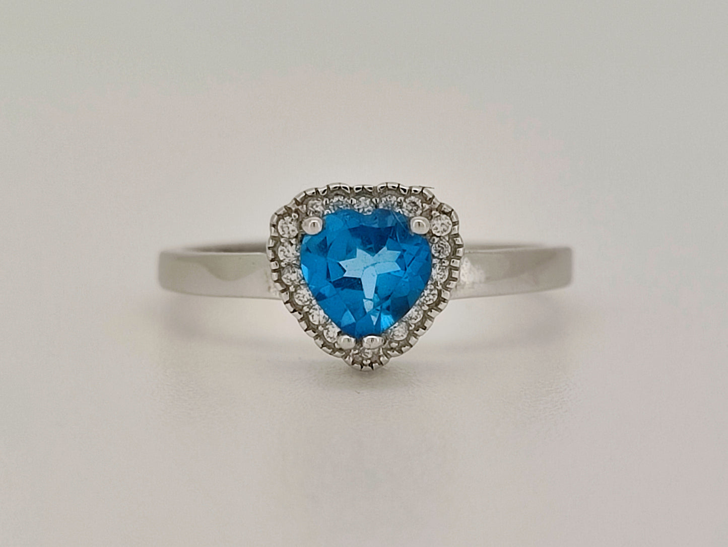 Heart Cut Swiss Blue Topaz and White Topaz Halo Ring