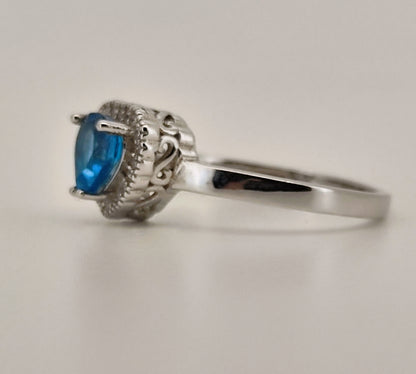 Heart Cut Swiss Blue Topaz and White Topaz Halo Ring