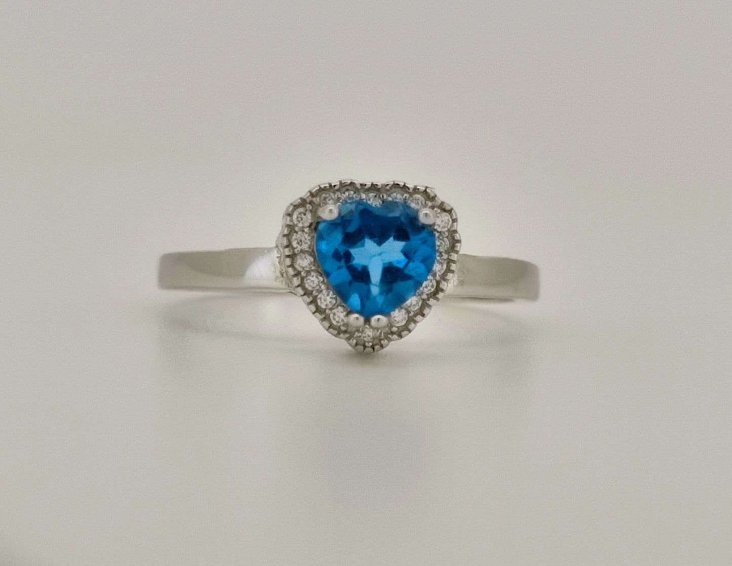 Heart Cut Swiss Blue Topaz and White Topaz Halo Ring