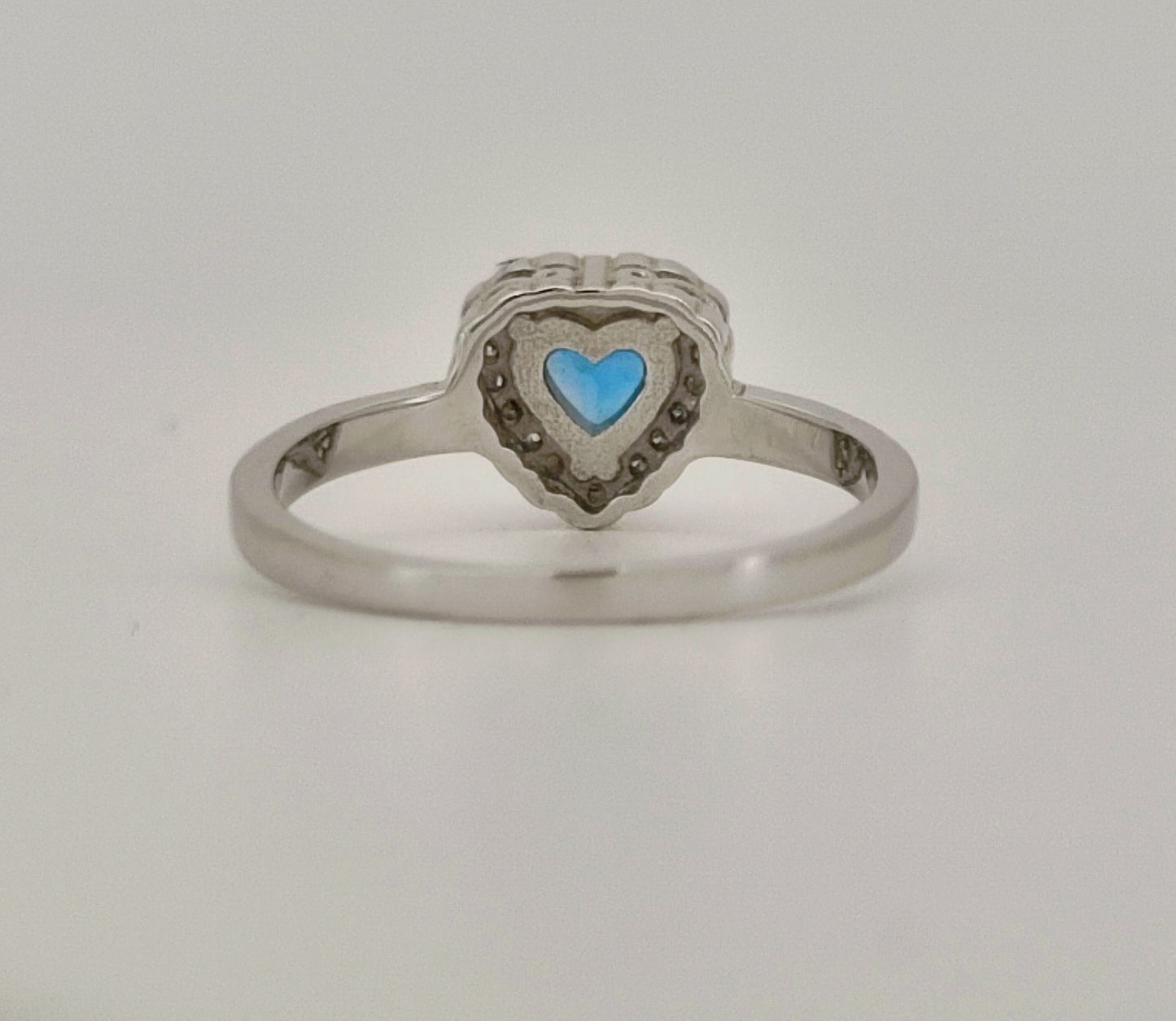Heart Cut Swiss Blue Topaz and White Topaz Halo Ring