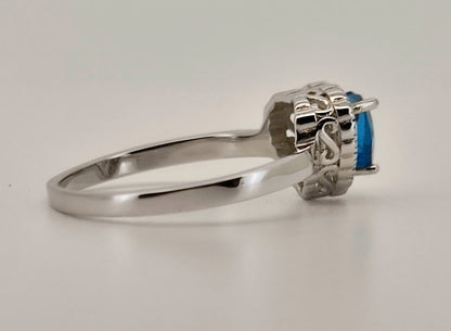 Heart Cut Swiss Blue Topaz and White Topaz Halo Ring