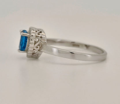 Heart Cut Swiss Blue Topaz and White Topaz Halo Ring
