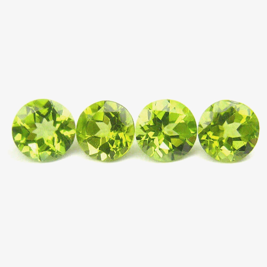 2 Pointer Round Brilliant Cut Peridots - Premium Jewelry from Dazzling Delights - Just $1.95! Shop now at Dazzling Delights