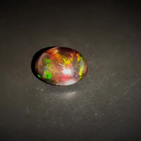 1.28ct Oval Cabochon Vivid Play of Colour Ethiopian Black Opal - Premium Jewelry from Dazzling Delights - Just $92.95! Shop now at Dazzling Delights
