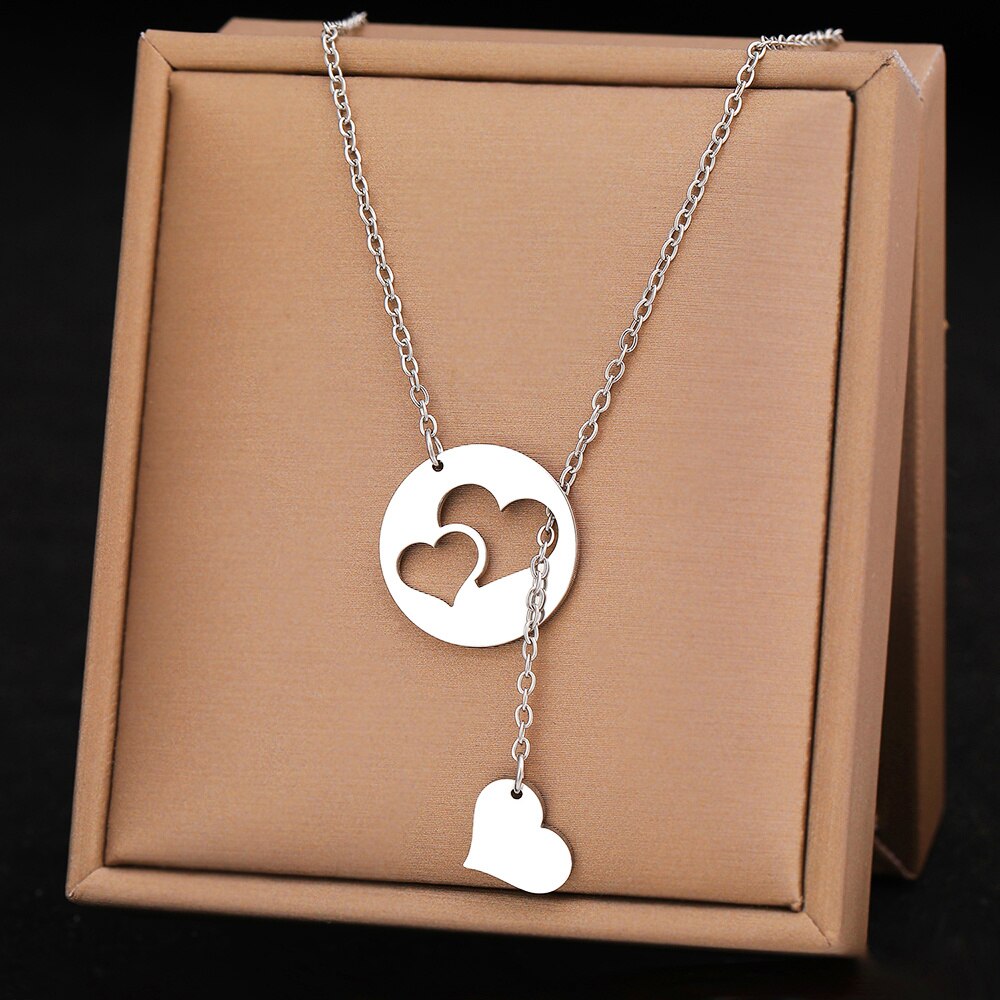 Silver Titanium Hollow and Solid Hearts Pendant Necklace - Premium Jewelry from Dazzling Delights - Just $22.95! Shop now at Dazzling Delights