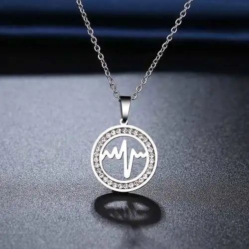 Silver Titanium Heartbeat Circle Of Love Pendant Necklace - Premium Jewelry from Dazzling Delights - Just $22.95! Shop now at Dazzling Delights