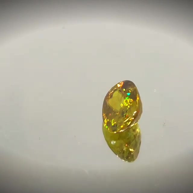 2.16ct Oval Cut Greenish Yellow Sphene With Rainbow Fire - Premium Jewelry from Dazzling Delights - Just $61.95! Shop now at Dazzling Delights