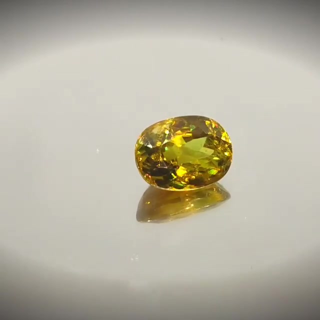 2.16ct Oval Cut Greenish Yellow Sphene With Rainbow Fire - Premium Jewelry from Dazzling Delights - Just $61.95! Shop now at Dazzling Delights