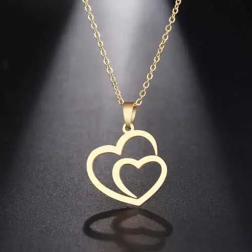 Gold Titanium Double Heart Pendant Necklace - Premium Jewelry from Dazzling Delights - Just $28.95! Shop now at Dazzling Delights