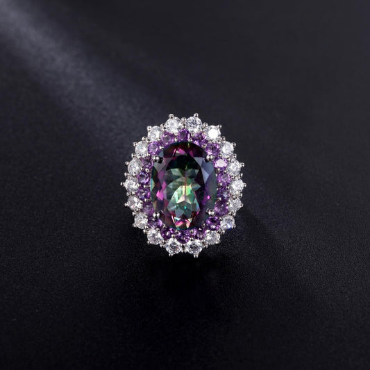 "The Iridescent Enigma" 16x12mm Oval Cut Mystic Topaz Double Halo Ring - Premium Jewelry from Dazzling Delights - Just $110.95! Shop now at Dazzling Delights